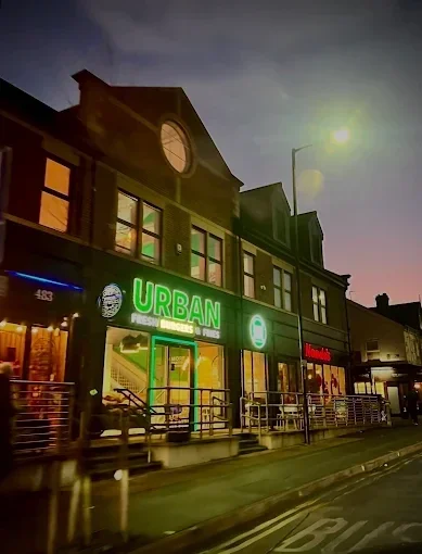 Holt Bar and Kitchen from outside full of people enjoying a night out