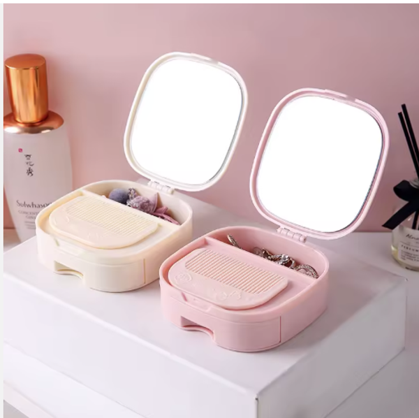Boîte à bijoux compacte avec miroir intégré – élégance et praticité