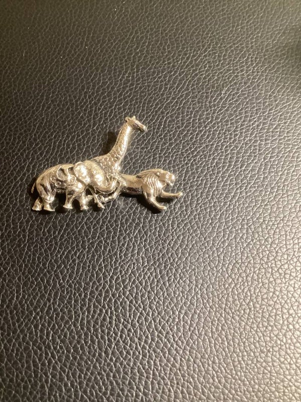 Jungle Jubilee: The Silver Safari Animal Pin