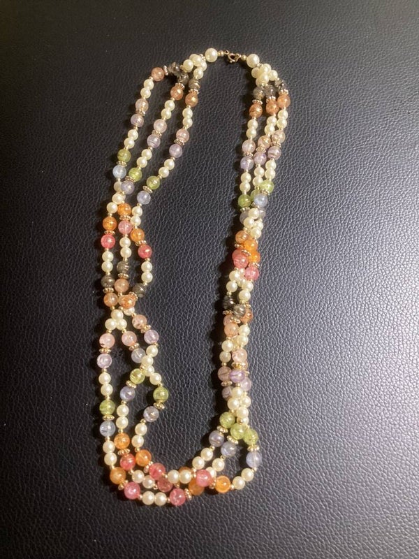 Pastel Perfection: The Triple-Strand Luminous Pearl Necklace