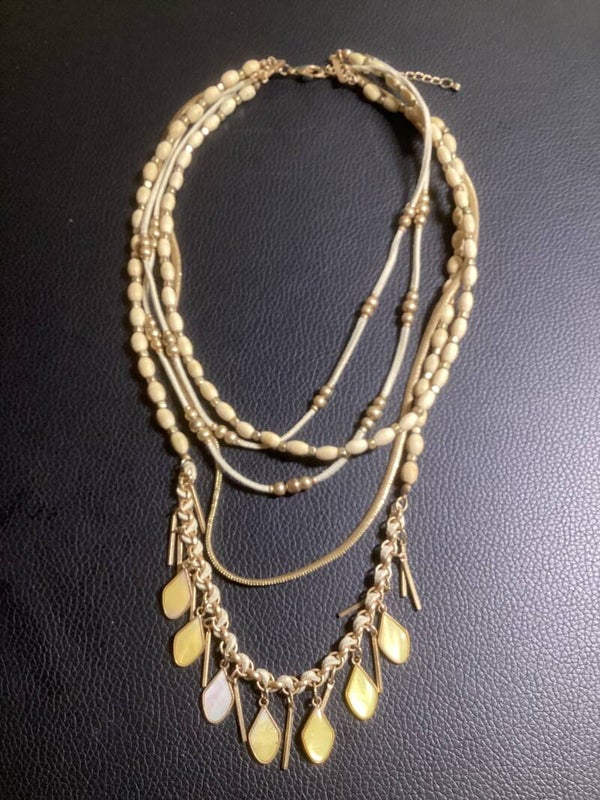Bone White Elegance: The Five-Strand Drip Statement Necklace