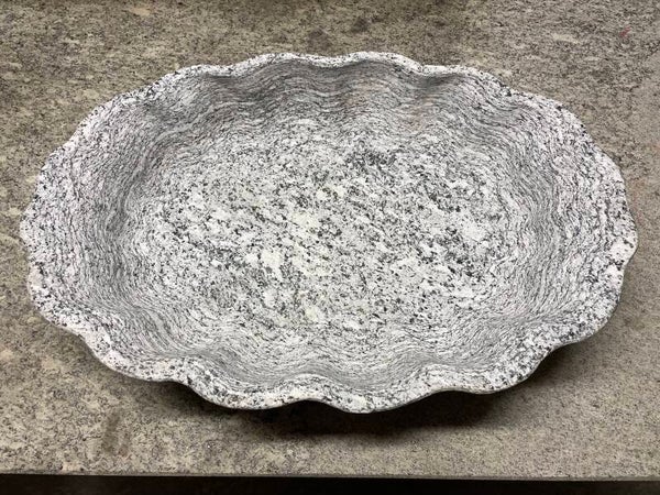 vaso in granito conchiglia