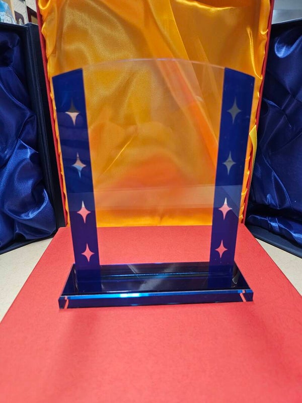 Large format acrylic award with blue accent star trim
