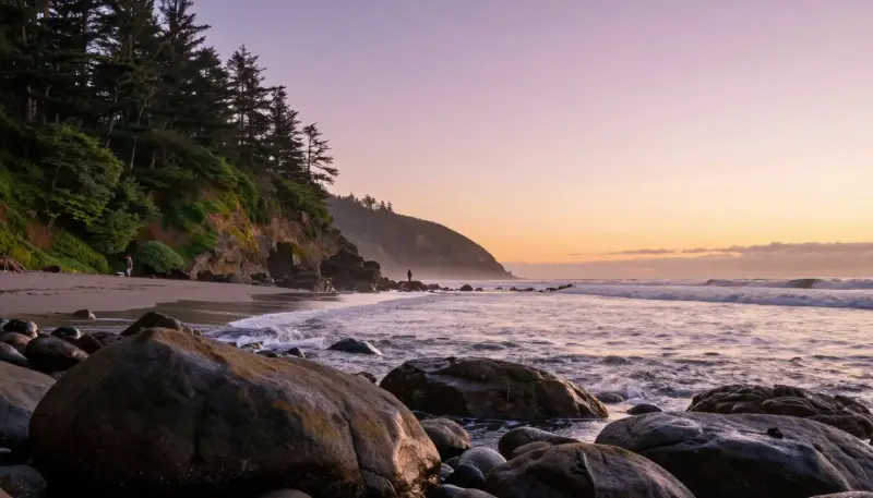Plage sauvage sur la côte de l’Oregon au coucher du soleil avec rochers et vagues, évoquant un profond sentiment de paix intérieure