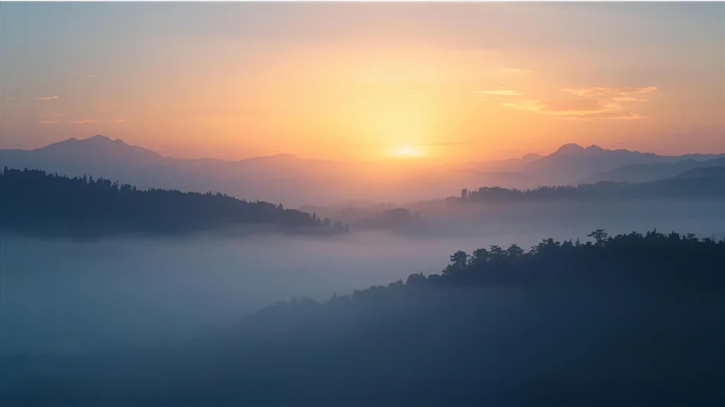 Peaceful sunrise over misty mountains, symbolizing clarity and transformation, perfect background for daily affirmations, meditation, and mind reprogramming.
