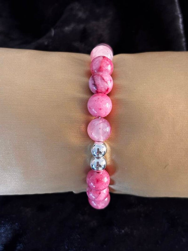 Set van rose aventurijn en rozenkwarts. Set bestaat uit armband, ketting en oorbellen