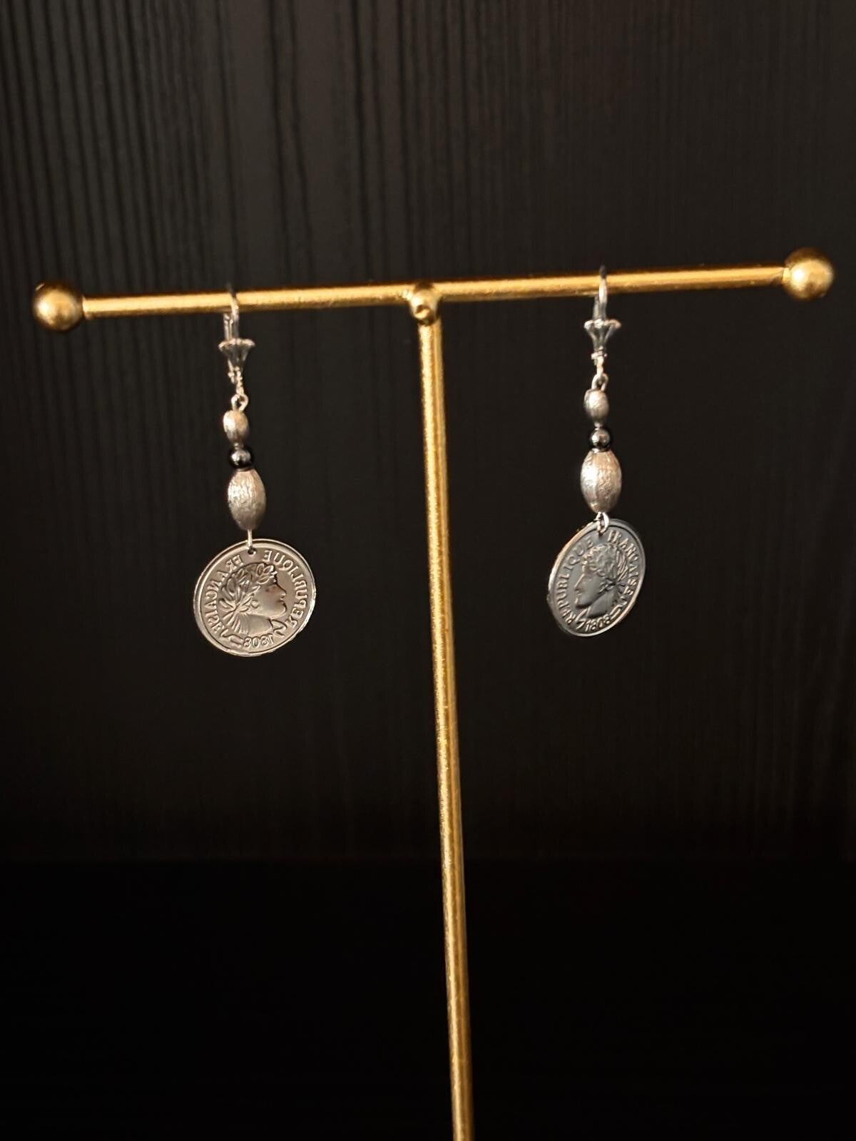 Muntbedel oorbellen zilver