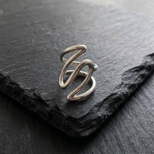 Flowing Silver Orbit
