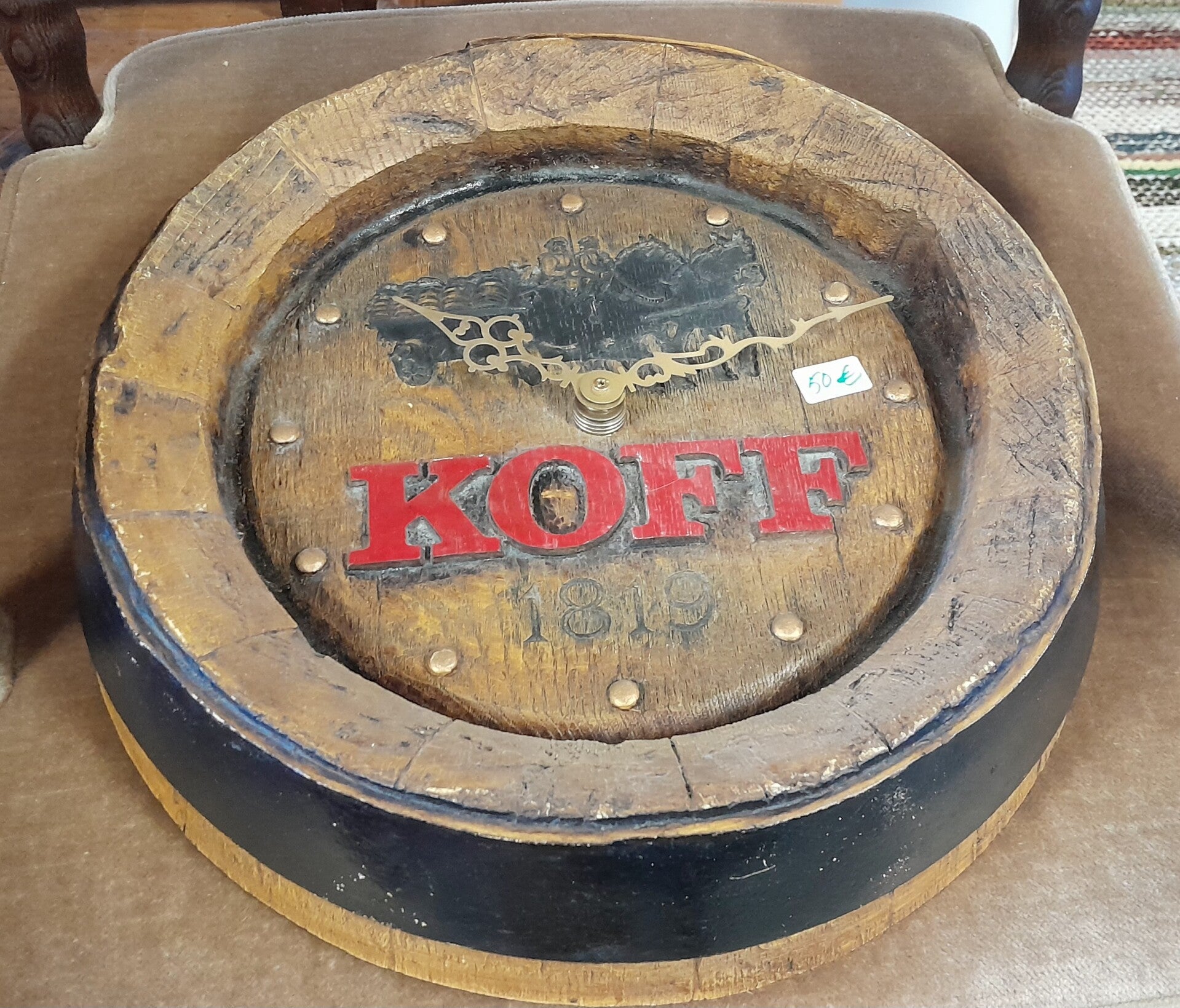 Tynnyrinpääty KOFF mainoskello