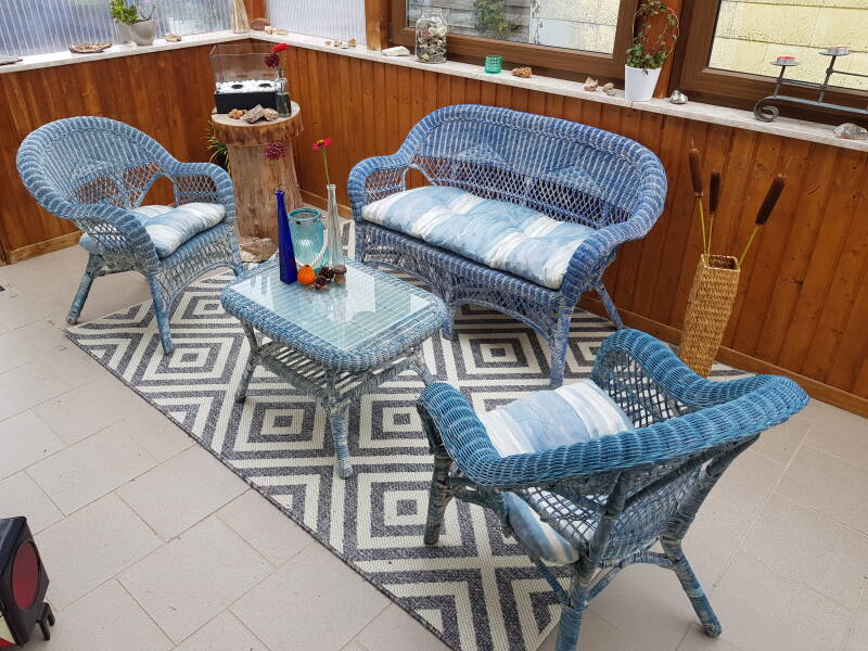 De serre om lekker even van de buitenlucht te genieten als het regent