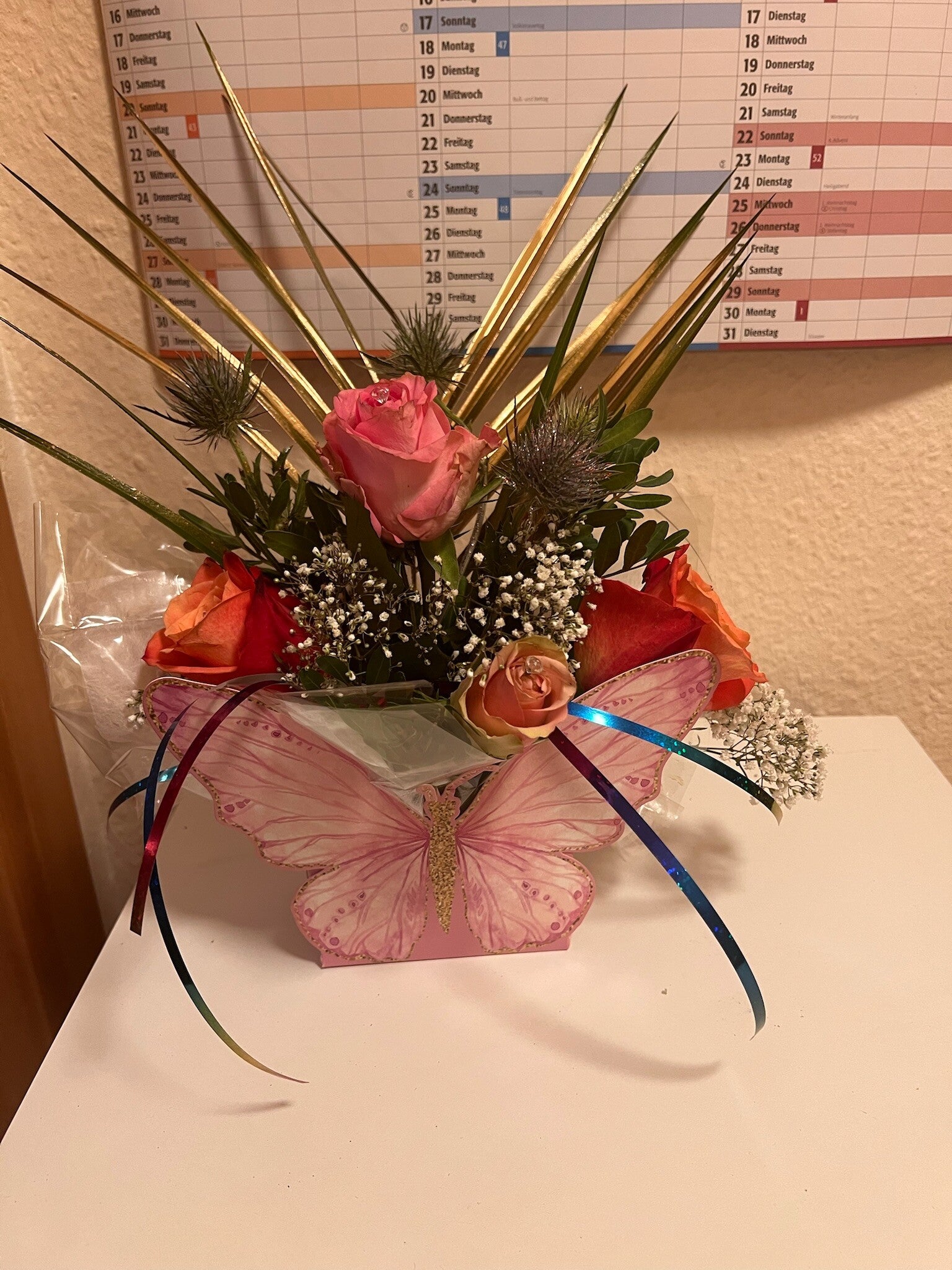 Blumenstrauß mit einem Schmetterling