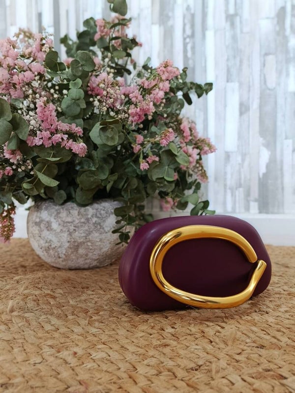 BOLSO MORADO MANO DORADO