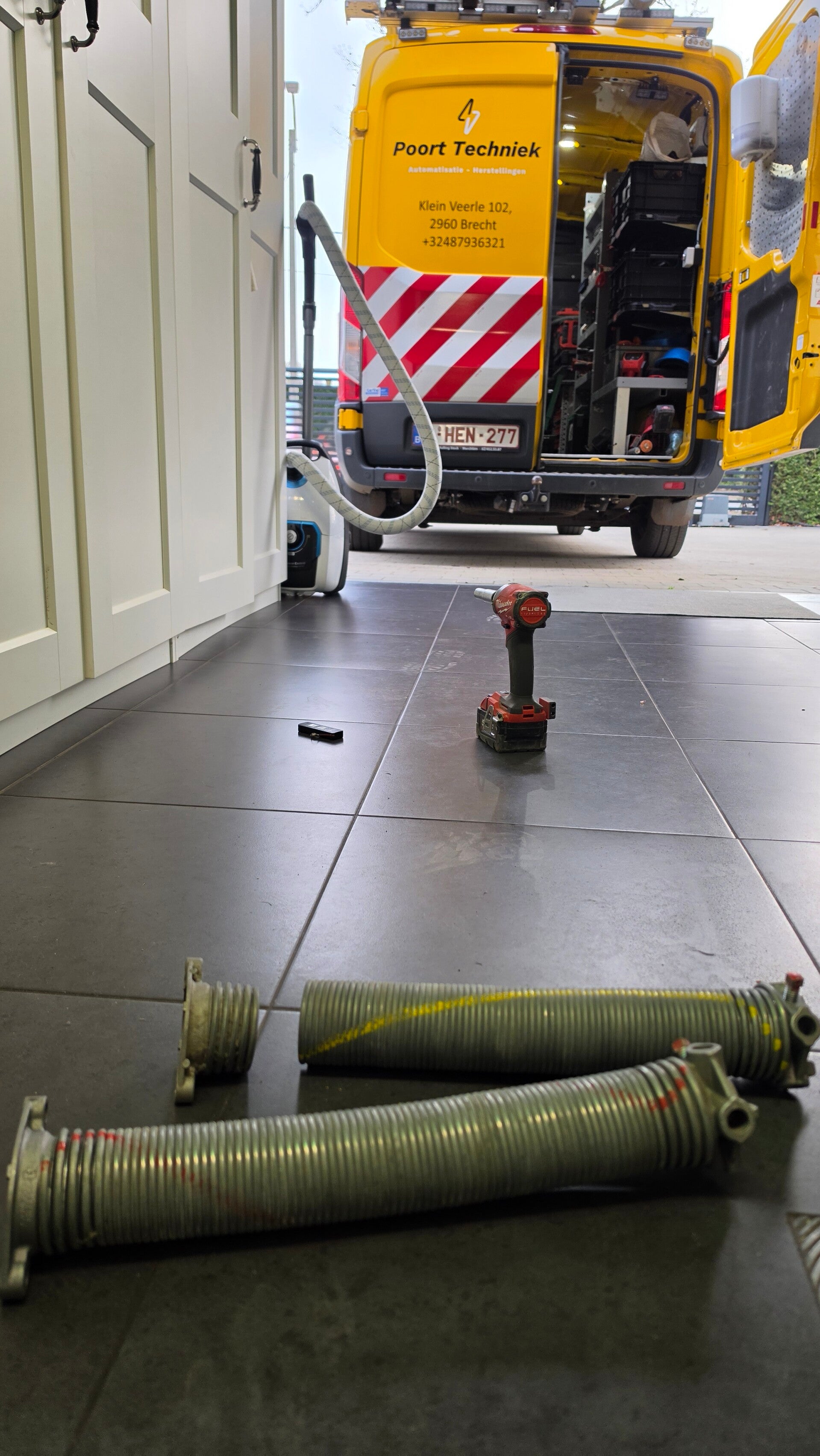Gebroken torsieveer garagepoort