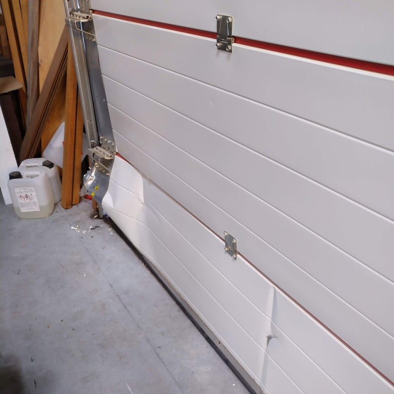 sectionaalpoort herstellen