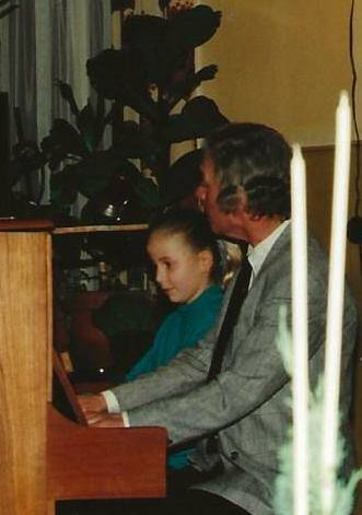 vier handen op één piano