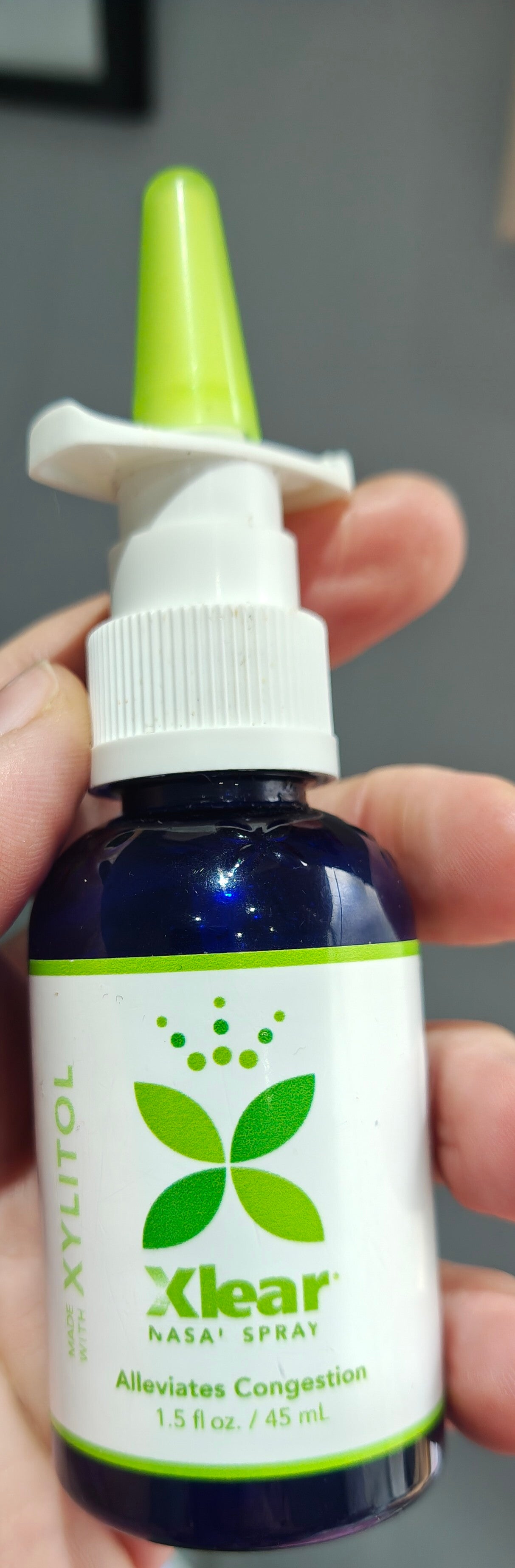 Saline nose spray for fluid in the middle ear.