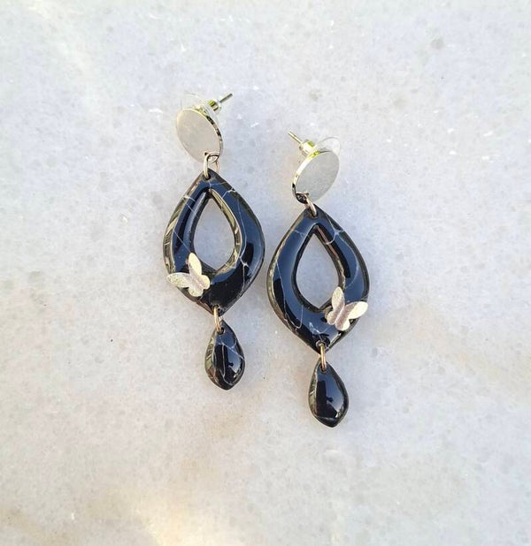 O.Q. Butterfly Silver