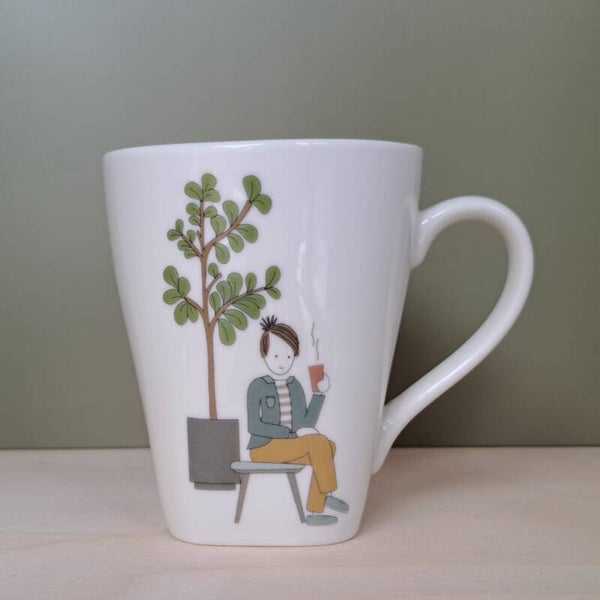 Mok - man aan het koffie drinken