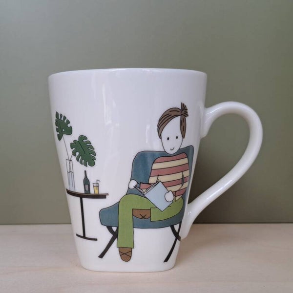 Mok - man aan het lezen