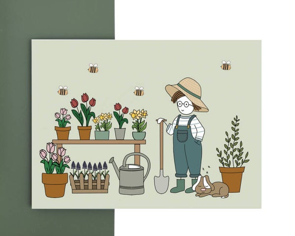 wenskaart - man tussen de voorjaarsbloemen