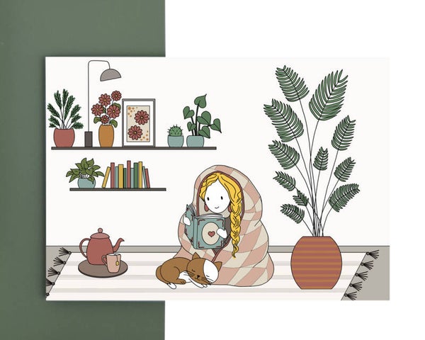 wenskaart - meisje lezen onder een dekentje