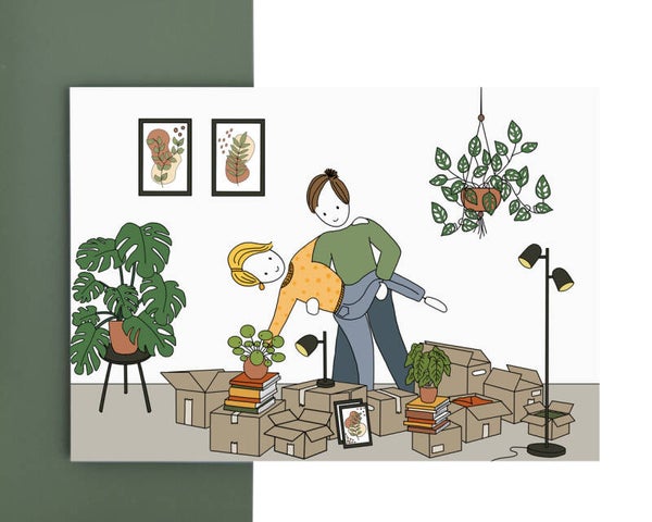 wenskaart - dansen tussen de verhuisdozen