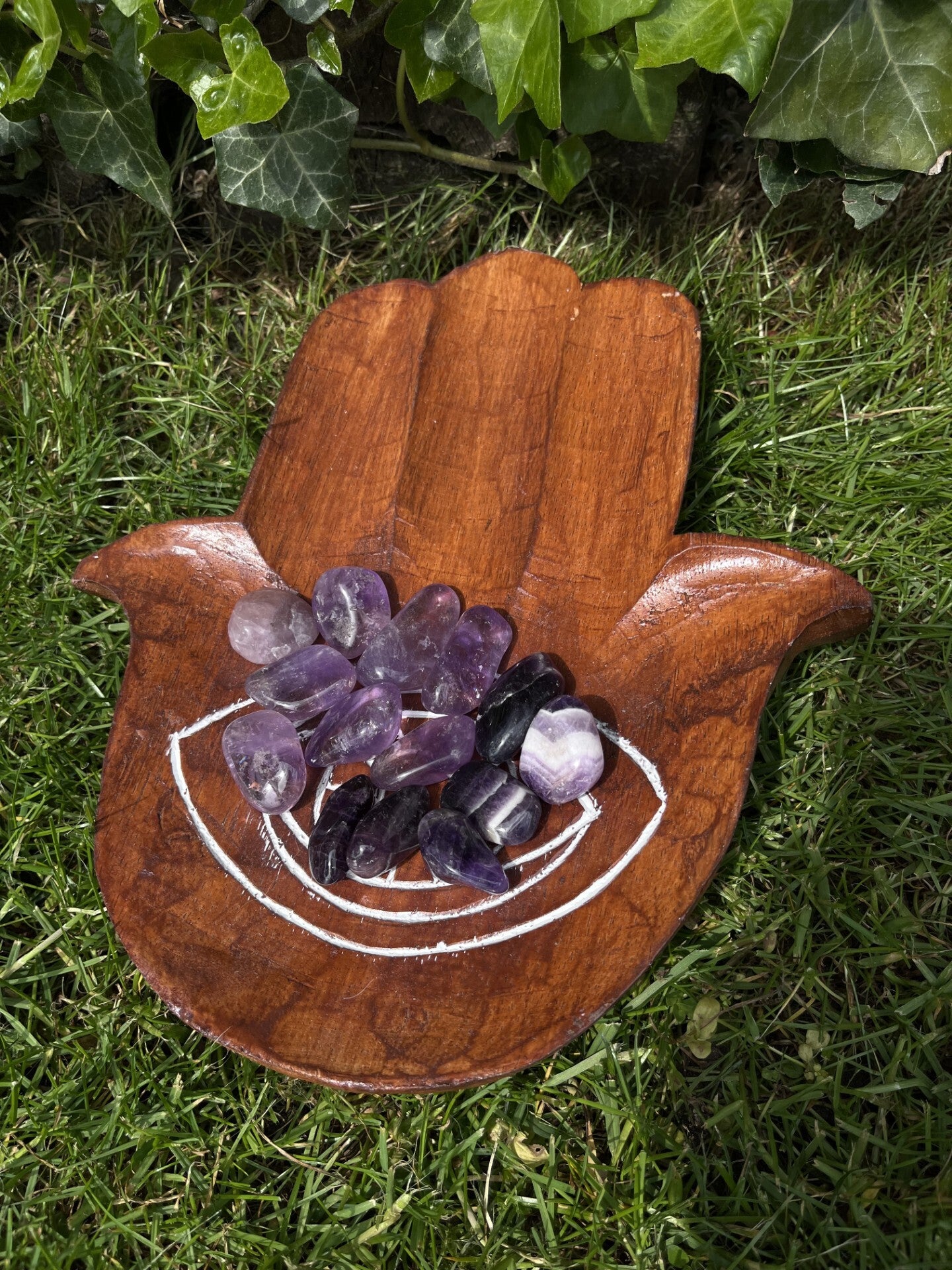 Amethist knuffelstenen licht gekleurd