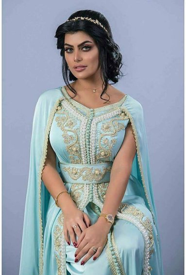 Model nummer 31 Takchita Jurk