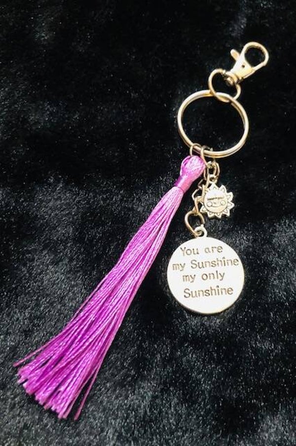 Sleutelhanger met tekst "you are my sunshine my only sunshine"