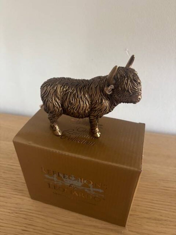 Reflections By Leonardo  Standing Highland Cow
