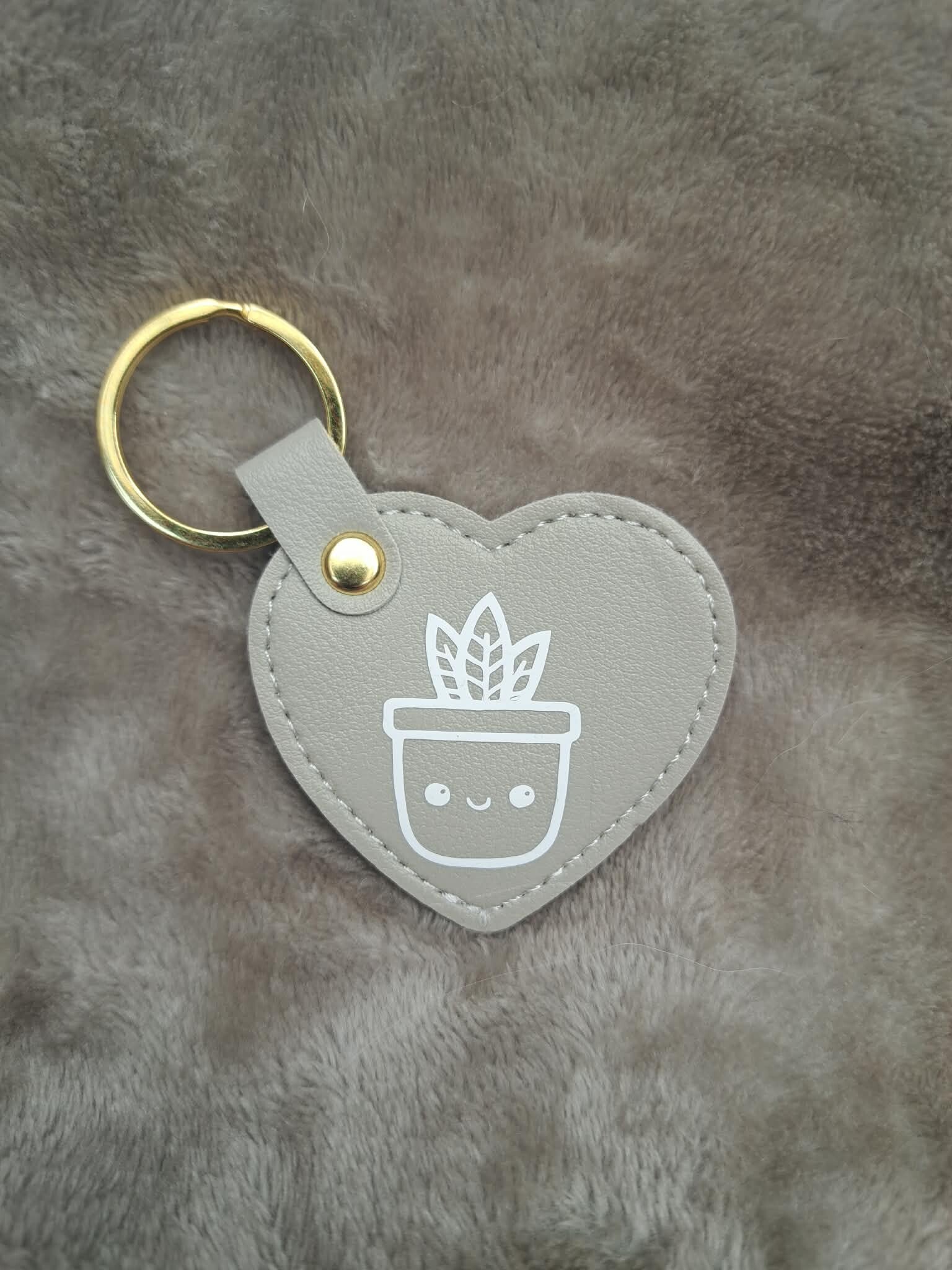 Porte-clé gris PLANTE