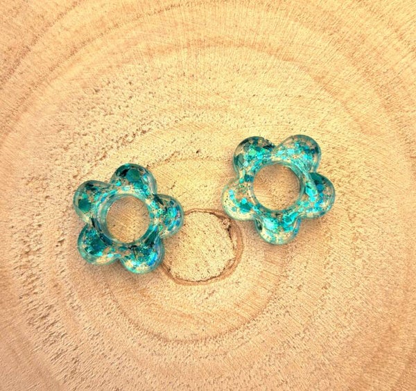 Fleurs paillettes bleues