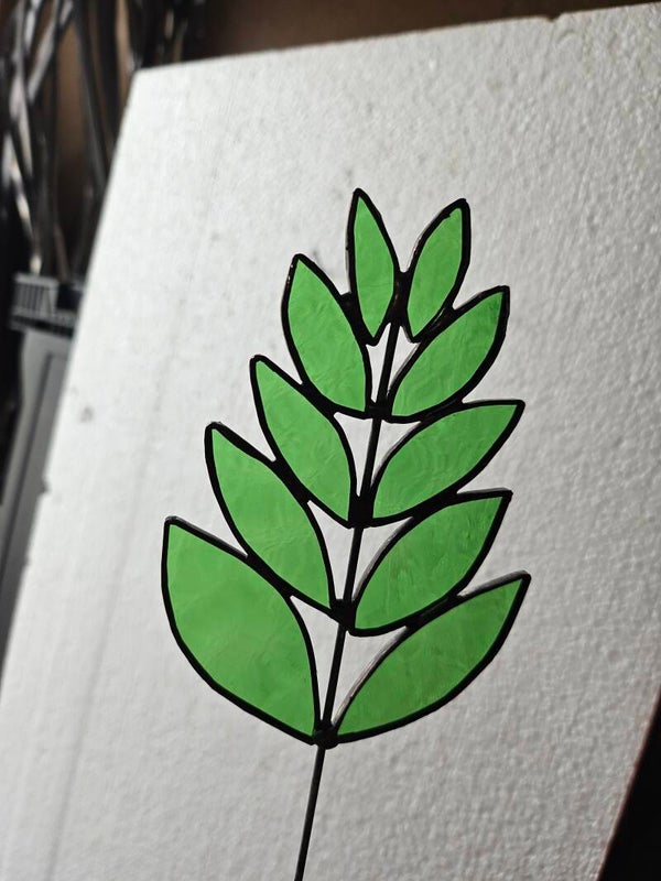 Groene blaadjes op steel