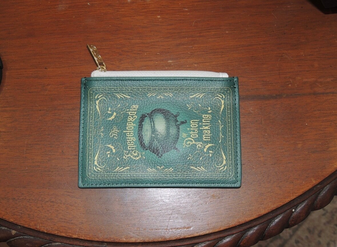 The encyclopaedia of potion making coin purse✨📚