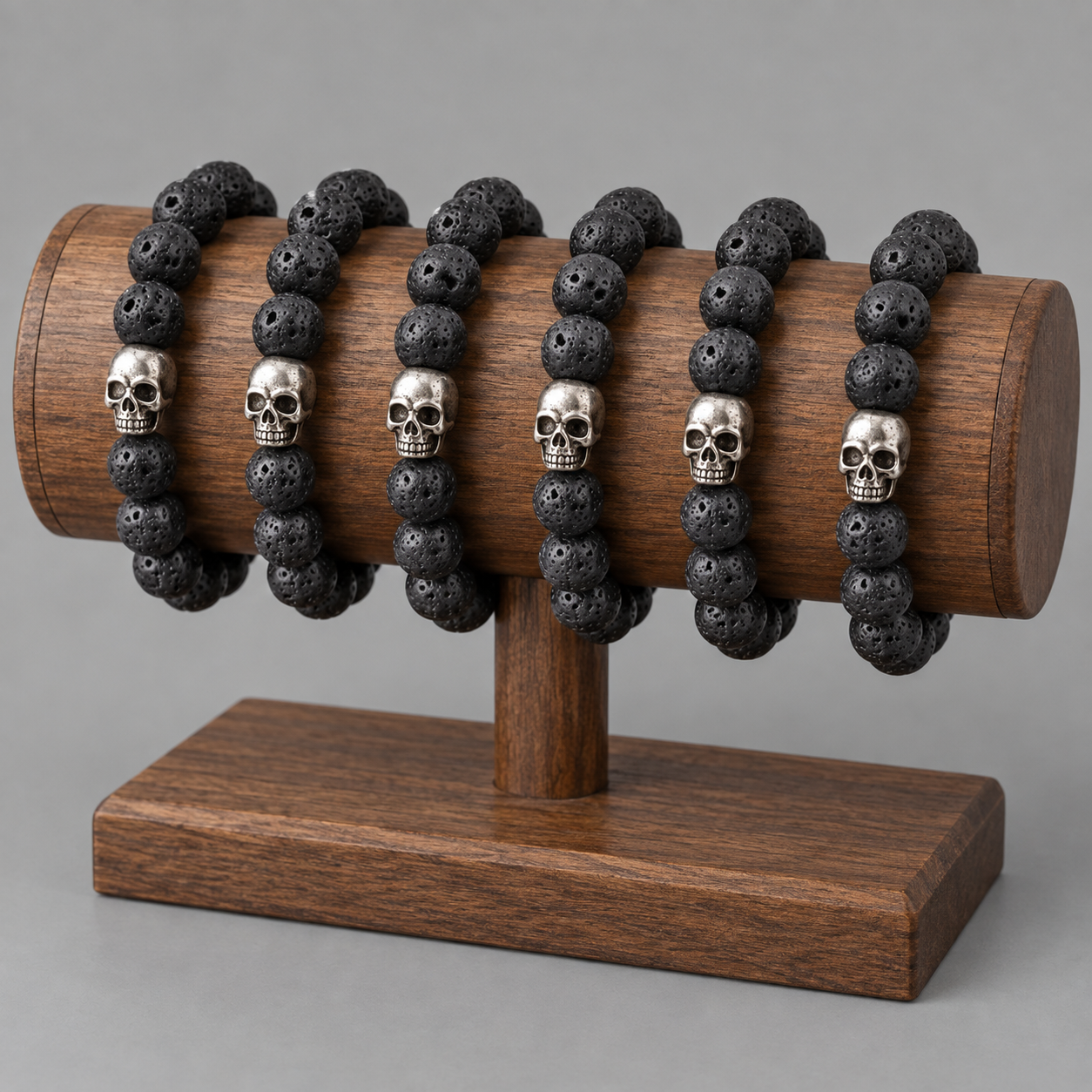 Bracelet perles noires effet pierre de lave – Tête de mort