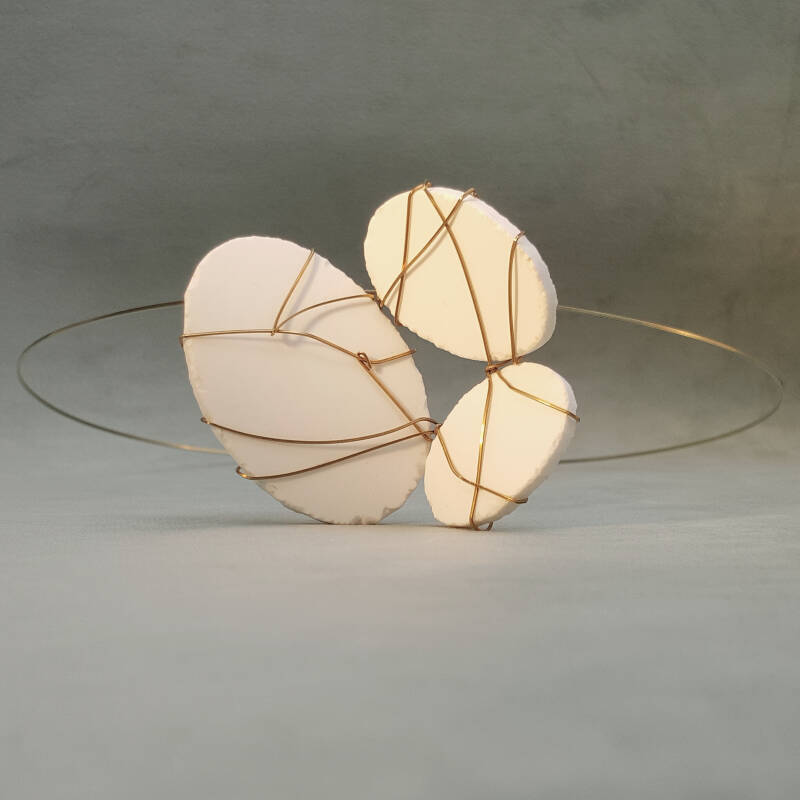 necklace made of shards of porcelain and brass