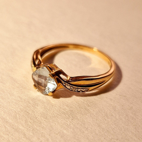 The ice blue geometric Topaz ring