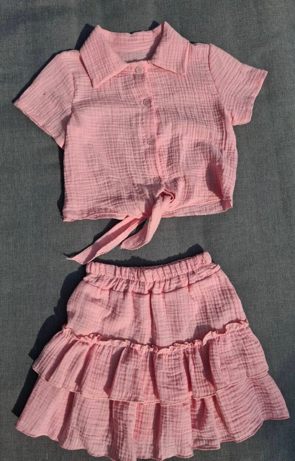 Roze set met knoop blouse