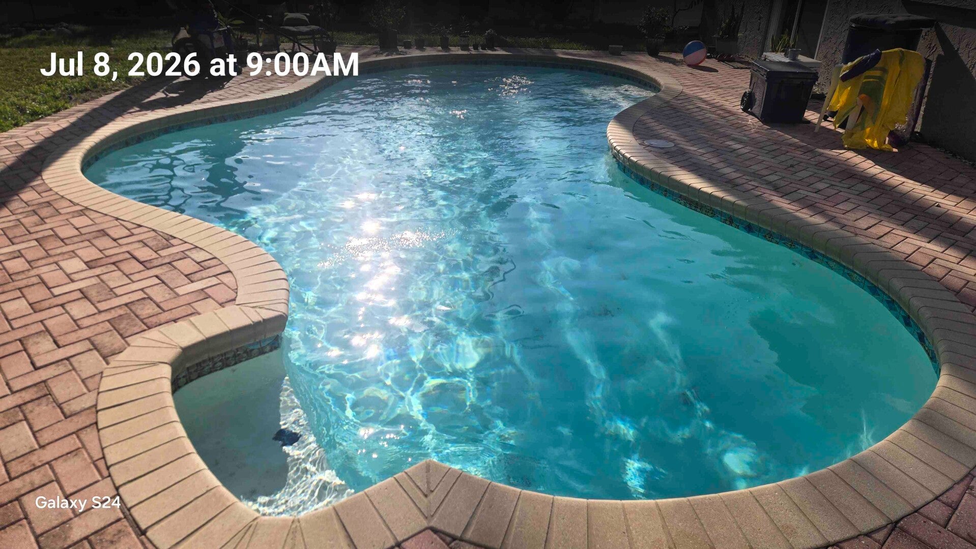 Clear blue pool cleaned by Aqua Glimmer Pool Services in Seminole, FL