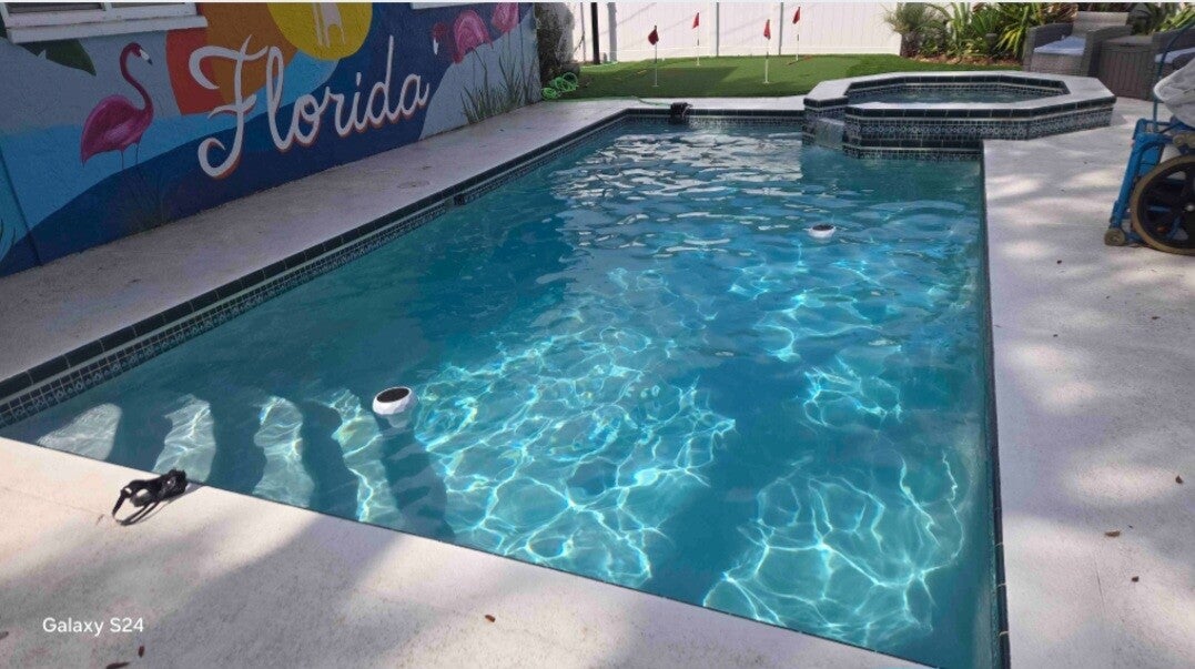 Clear blue pool serviced by Aqua Glimmer Pool Services in Indian Rocks Beach, FL