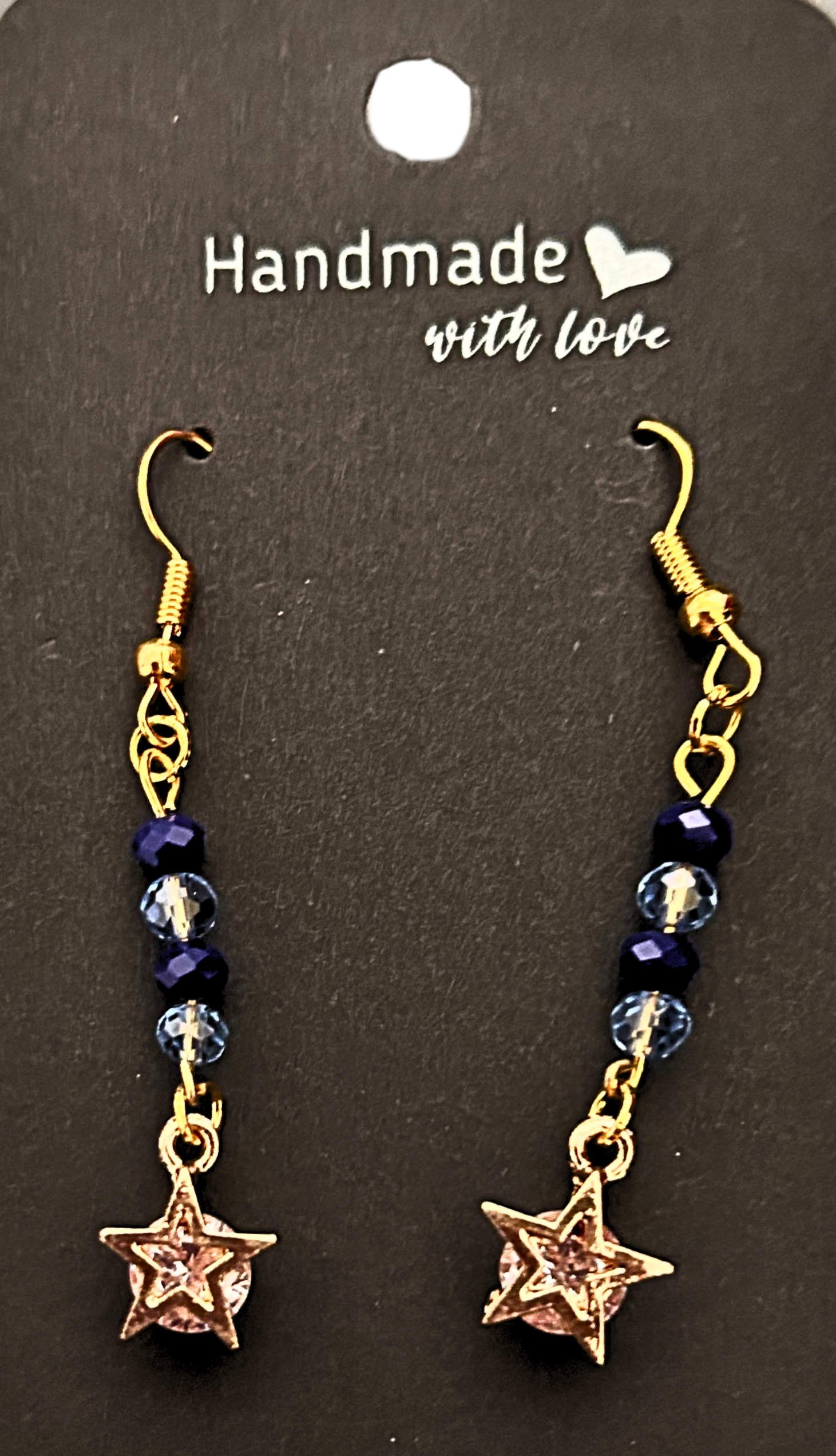 Gold-plated blue beaded earrings with a cubic zirconia star earrings