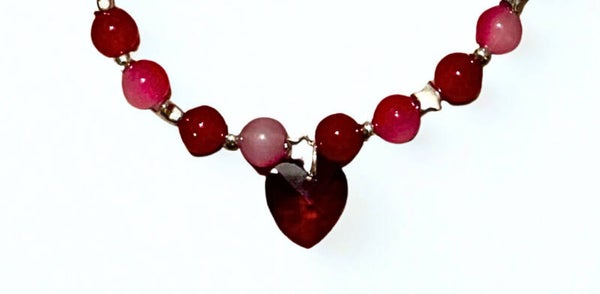 Hypoallergenic silver-plated red beaded necklace with a glass red heart charm