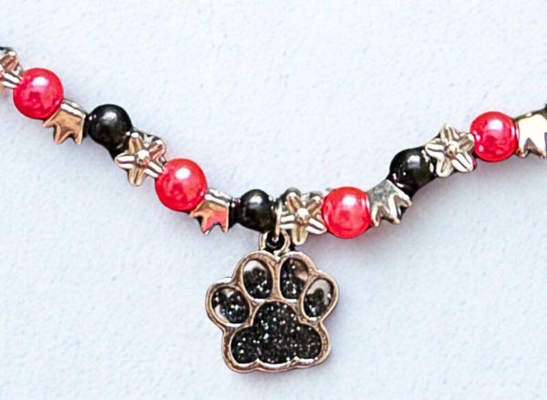 Hypoallergenic Silver-plated black glittered paw necklace