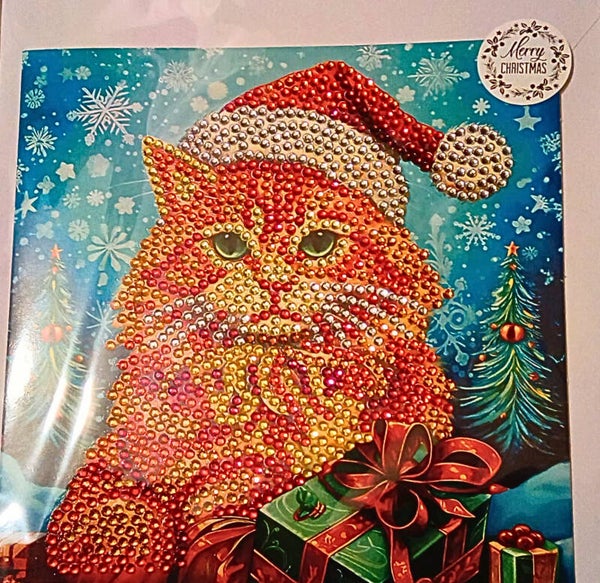 Ginger cat with present Christmas card