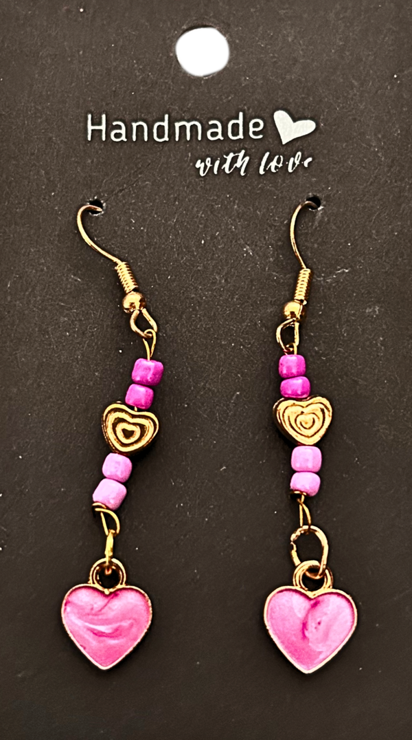 Gold-plated dark and light pink beaded earrings with a dark pink heart charms