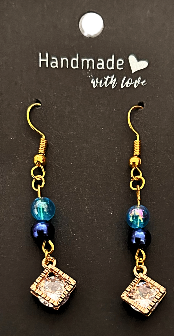 Gold-plated blue beaded earrings with a cubic zirconia diamond shaped earrings