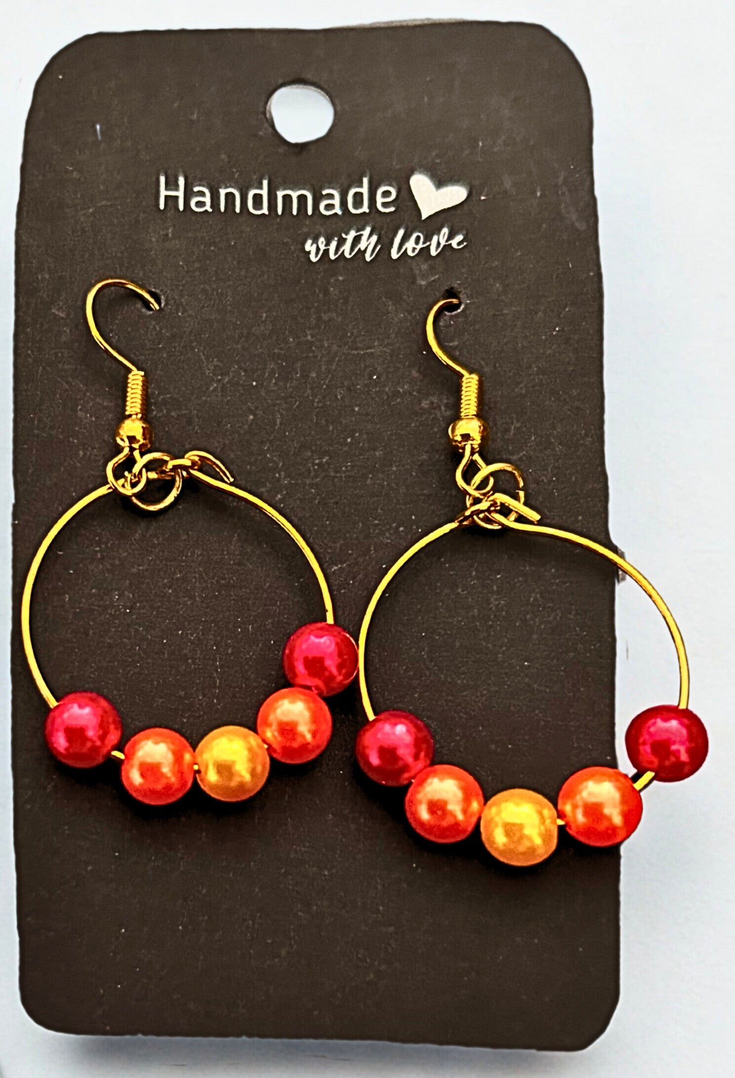 Gold-plated red beaded hoop earrings