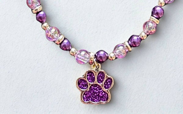 Hypoallergenic Silver-plated purple glittered paw necklace