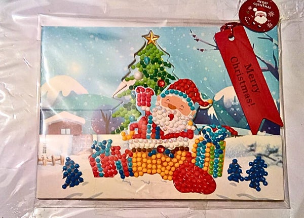Santa in the toy slat poo up Christmas card