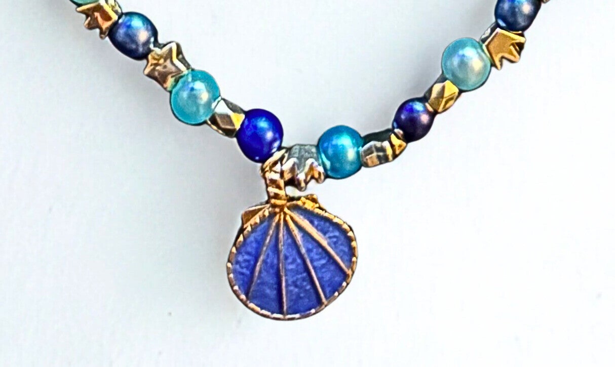 Hypoallergenic Gold-plated multi-blue beaded necklace with a blue shell charm